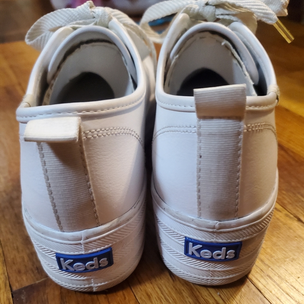 Keds Triple Up White Leather Sneaker With Gold Accents.
